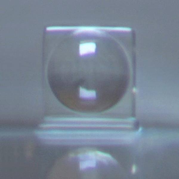 A 3D printed silica glass microlens