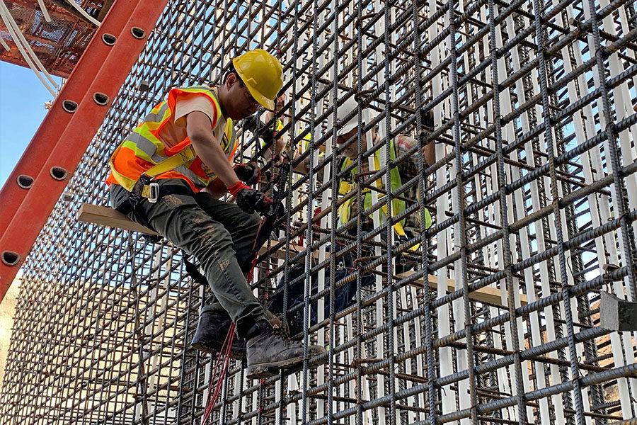 Construction worker on scaffold