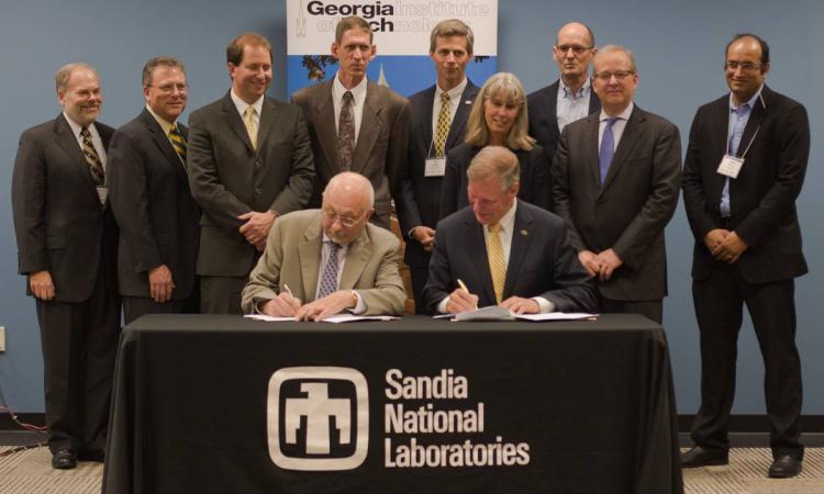 Sandia National Laboratories (represented by Dr. Paul Hommert, director of Sandia National Laboratories and president of Sandia Corporation) and Georgia Institute of Technology (represented by President G. P. "Bud" Peterson) form academic collaboration by signing a five-year memorandum of understanding (MOU), establishing a strategic collaboration that seeks to solve science and technology problems of national importance.