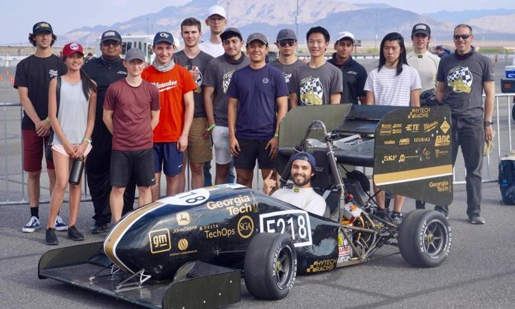 students with winning race car