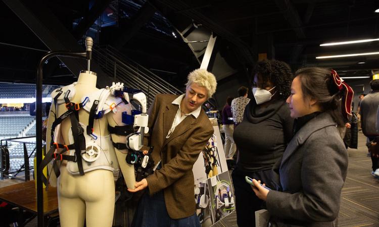 people looking at wearable device
