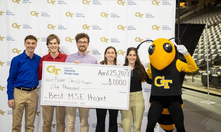 the MSE group Power (Density) Rangers with Buzz and the winner's check