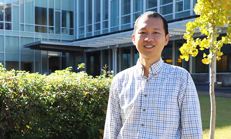 Peng Qiu outside the Marcus Nanotechnology Building.