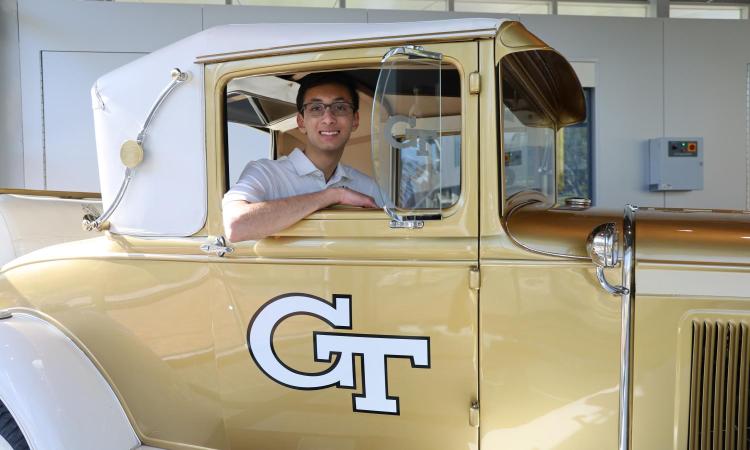 Wreck driver Omar Khan sits in passenger seat of Wreck