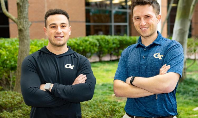 Georgia Tech alumni Jonathan Fitch and Cole Chalhub stand outside