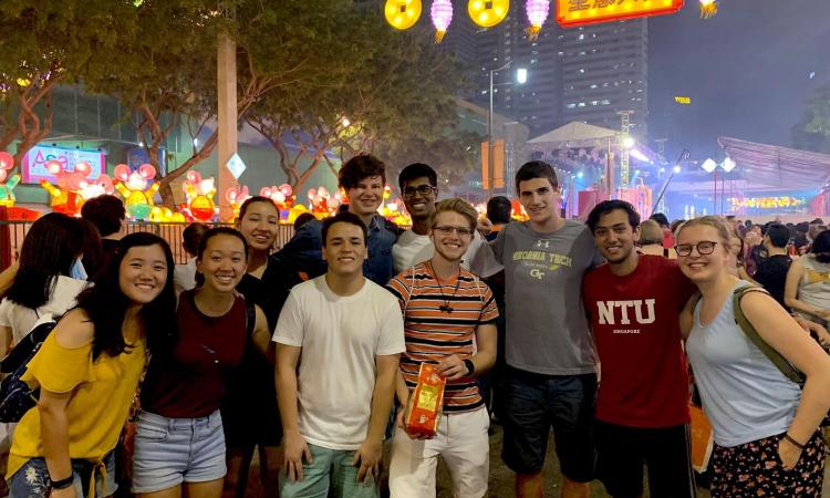 Students pause for a picture in Singapore's Chinatown.