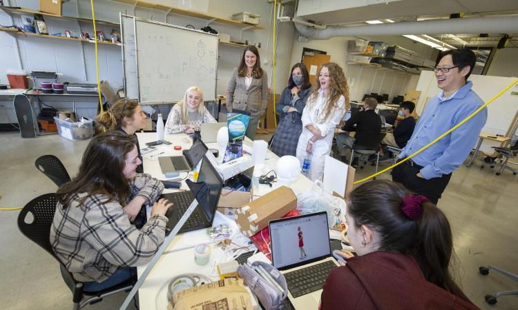 Student teams meeting with Audrey McLoghlin