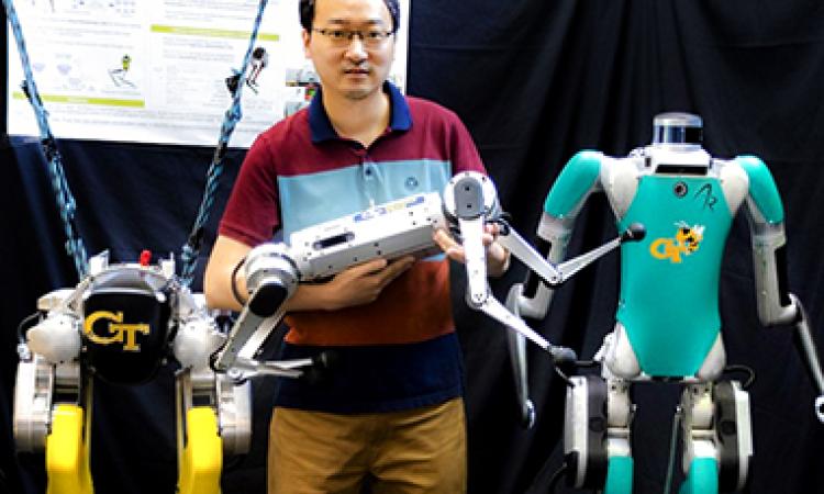 Ye Zhao with robots