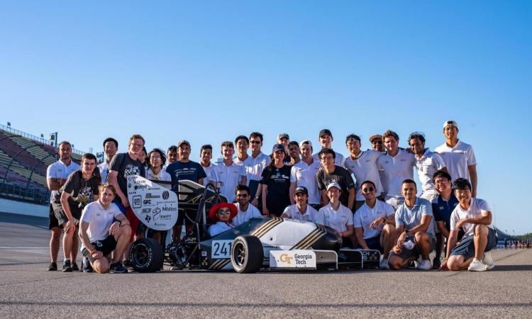 The HyTech Racing team with their car