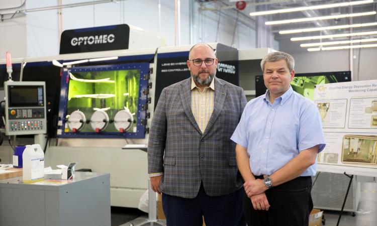 Aaron Stebner and Tom Kurfess in the Advanced Manufacturing Pilot Facility.