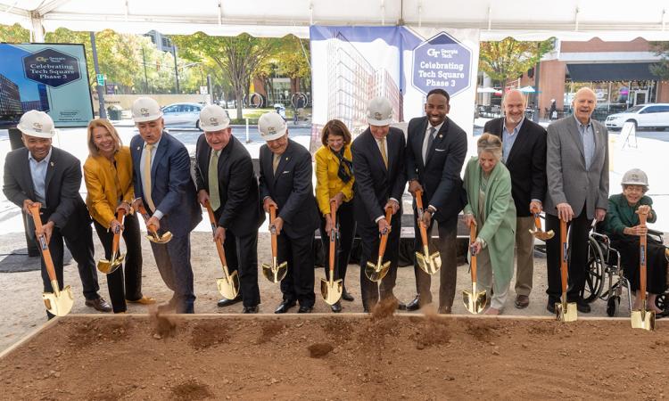 Leaders turn over the first dirt at the site of the future Tech Square Phase 3 towers.