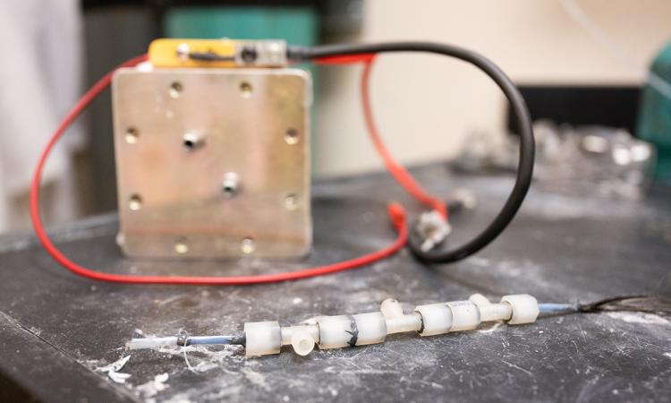 An example of a flow battery from Georgia Tech: A small square of metal with read and black wires.