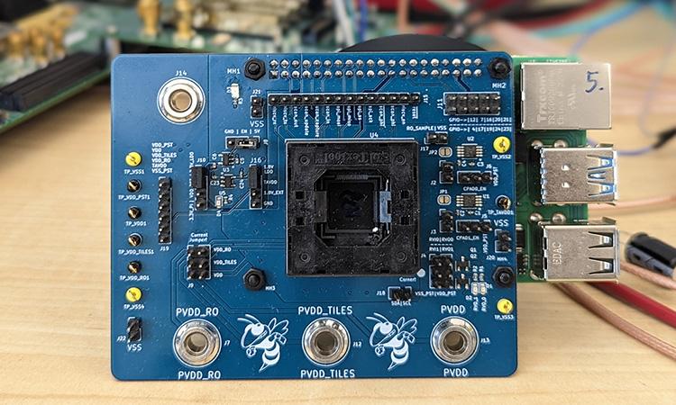 The final chip created by the student groups in ECE 4804 embedded in a printed circuit board.