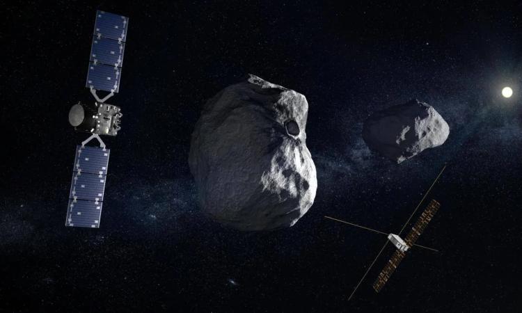 Conceptual graphic showing ESA’s Hera spacecraft and its CubeSats in orbit around the Dimorphos moonlet. Photo courtesy of European Space Agency (ESA) Science Office.