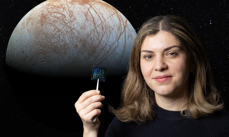 composite image of a woman holding an electronic chip with Europa in the background