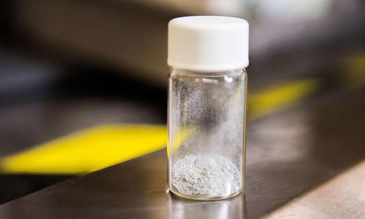 A vial of aluminum-based powder. Scientists at the Army Research Laboratory found that an aluminum-based powder prompts hydrogen to split from water. Now, a Georgia Tech-led partnership will carry that research forward. (Photo Courtesy: U.S. Army)