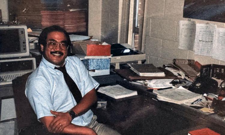 John Uyemura at his desk