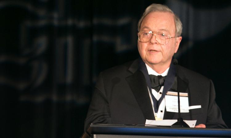 John Durstine speaks at his induction to the College of Engineering Hall of Fame in 2014.