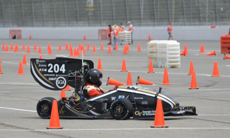 HyTech Racing's electric formula car on the course at the Formula SAE-EV 2025 competition.