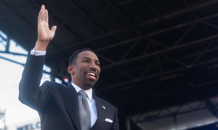 Atlanta Mayor Andre Dickens waves at his inauguration in 2022.