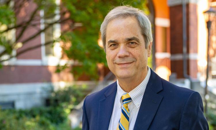 Doug Williams headshot outside Tech Tower