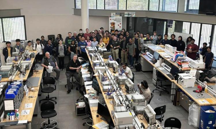 Group photo in the Interdisciplinary Design Commons of students at the Georgia Tech Amateur Radio Bootcamp.