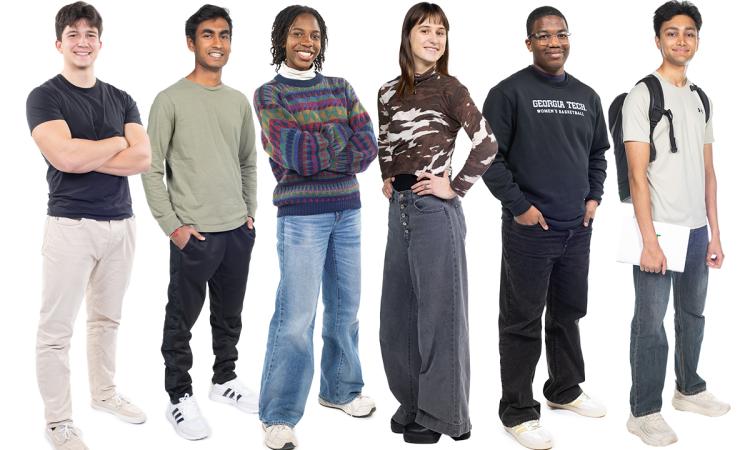 six students standing together against a white background