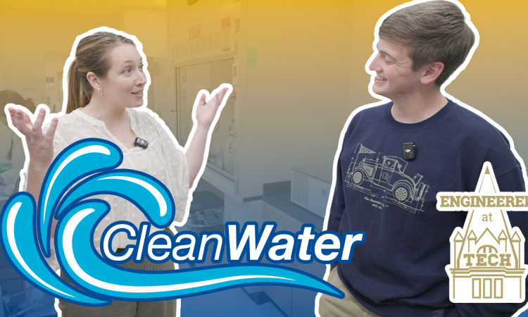 Two people talking to each other in a lab with a graphic titled "clean water" on it. 