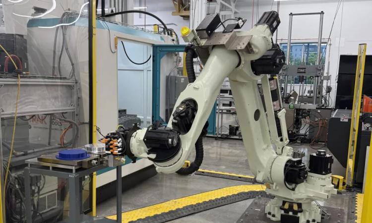 A robotic arm in the Advanced Manufacturing Pilot Facility