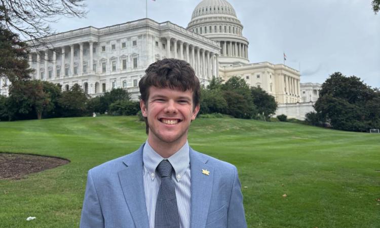 Sam Woolsey poses in front of the U.S. Capitol.