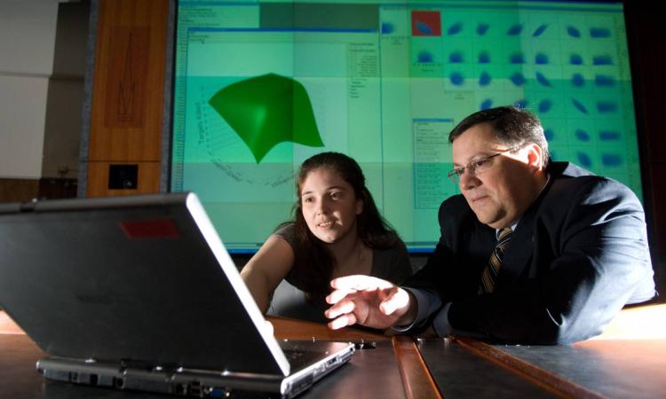 Marvis in computer lab with student
