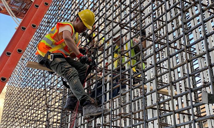 Construction worker on scaffold