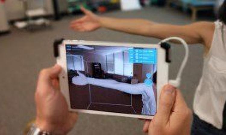 An app and a camera attachment are now all that are needed to check for early onset lymphedema in breast cancer survivors. Credit: LymphaTech / Georgia Tech