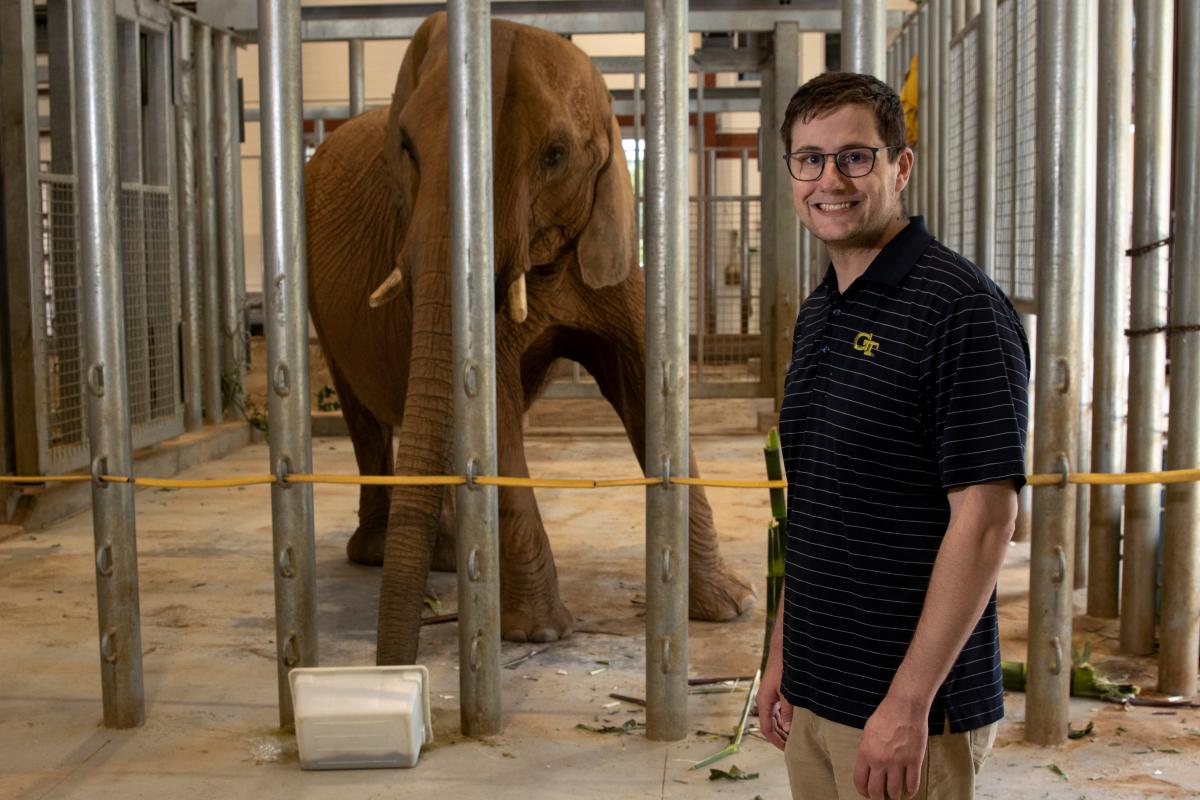 Andrew Schulz with an elephant