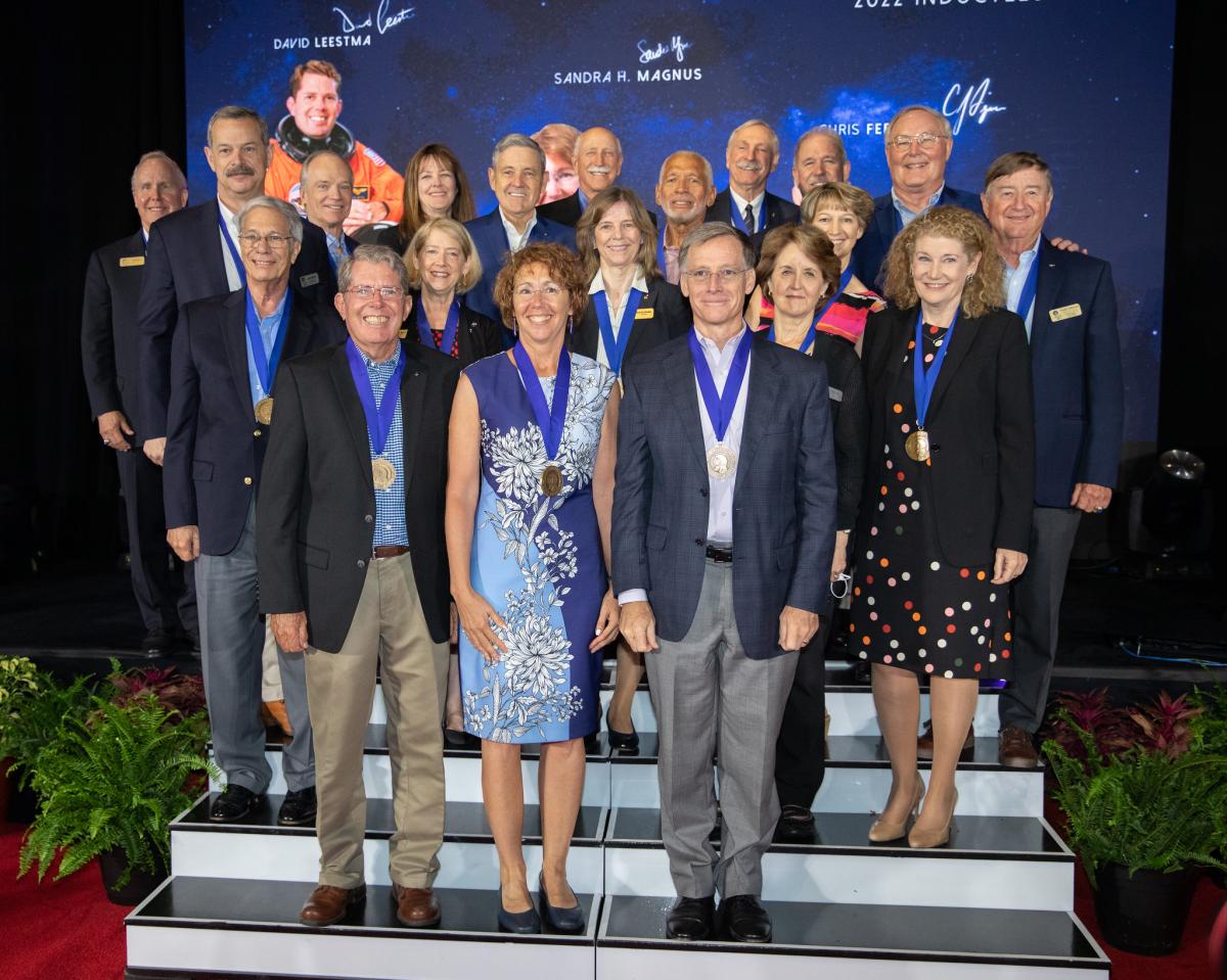 a group picture of Astronaut Hall of Fame inductees, including Sandy Magnus