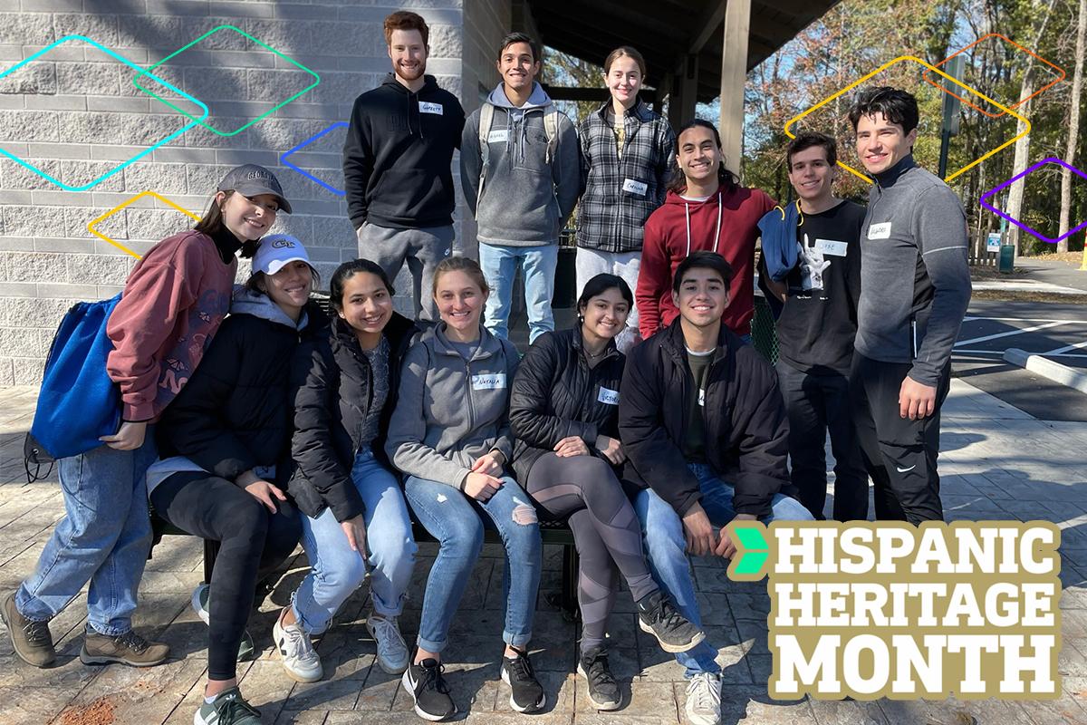 Group of students with graphic "Hispanic Heritage Month"