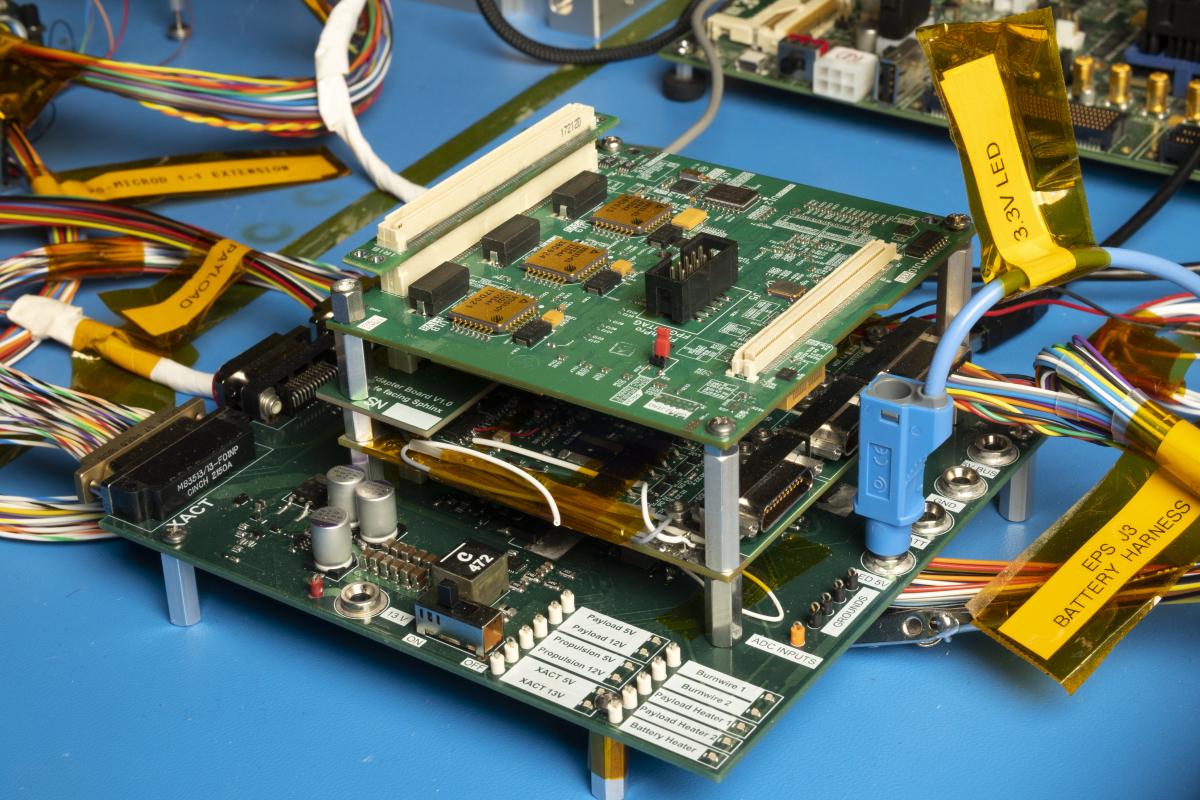closeup of the control electronics stack, a stack of circuitboards, on the satellite test bed