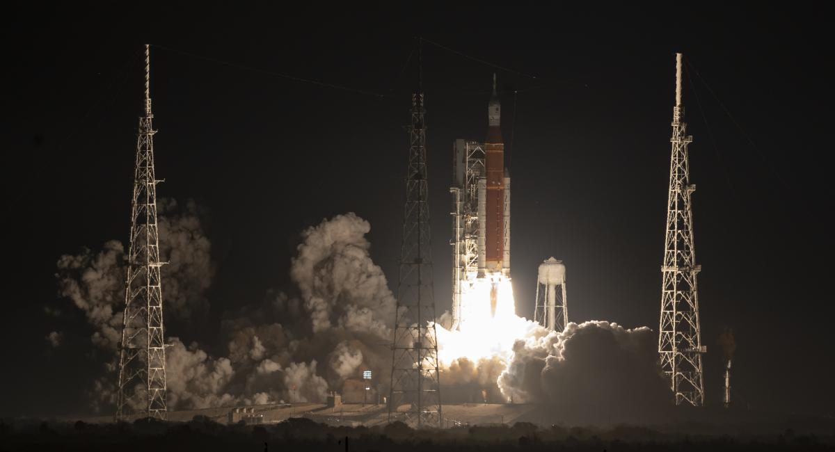 Artemis rocket launching into a night sky