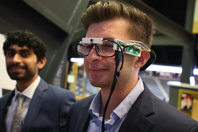 student wearing electronic glasses