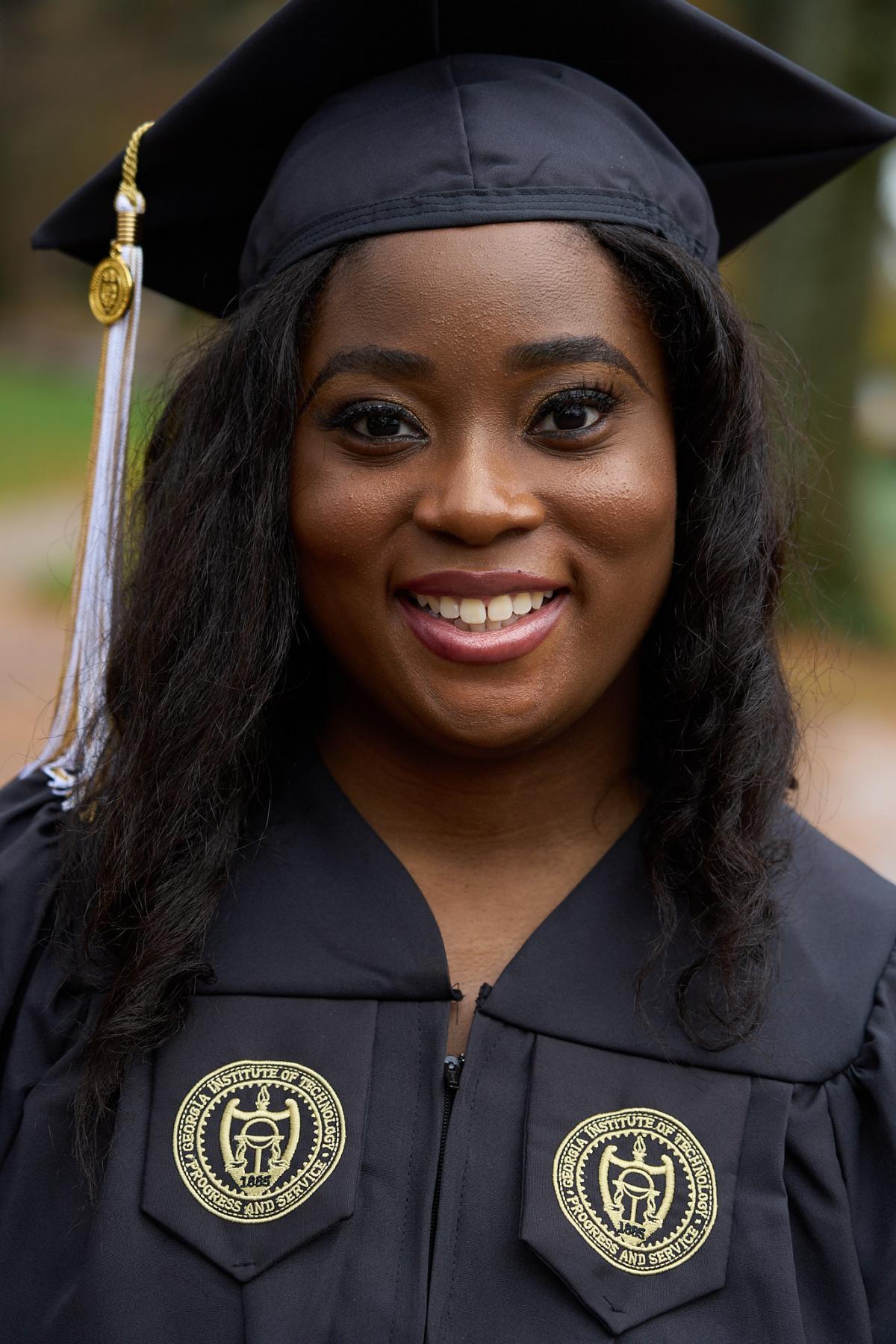 headshot of Gabrielle Brim in commencement regalia