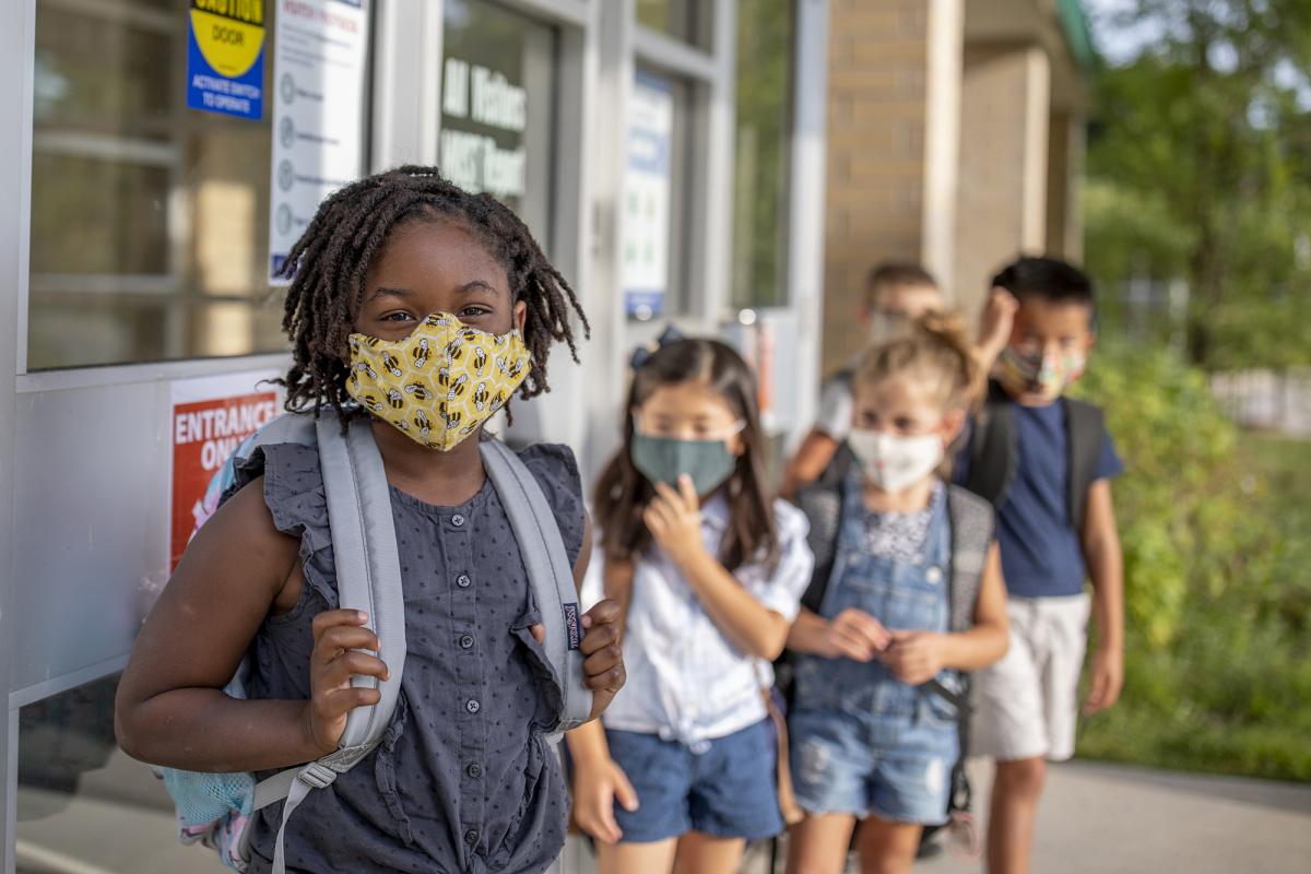 Children wearing masks at school