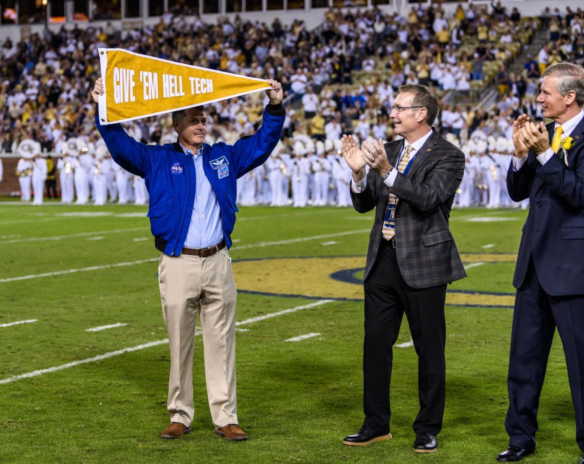 Shane Kimbrough with Ramblin' Wreck flag