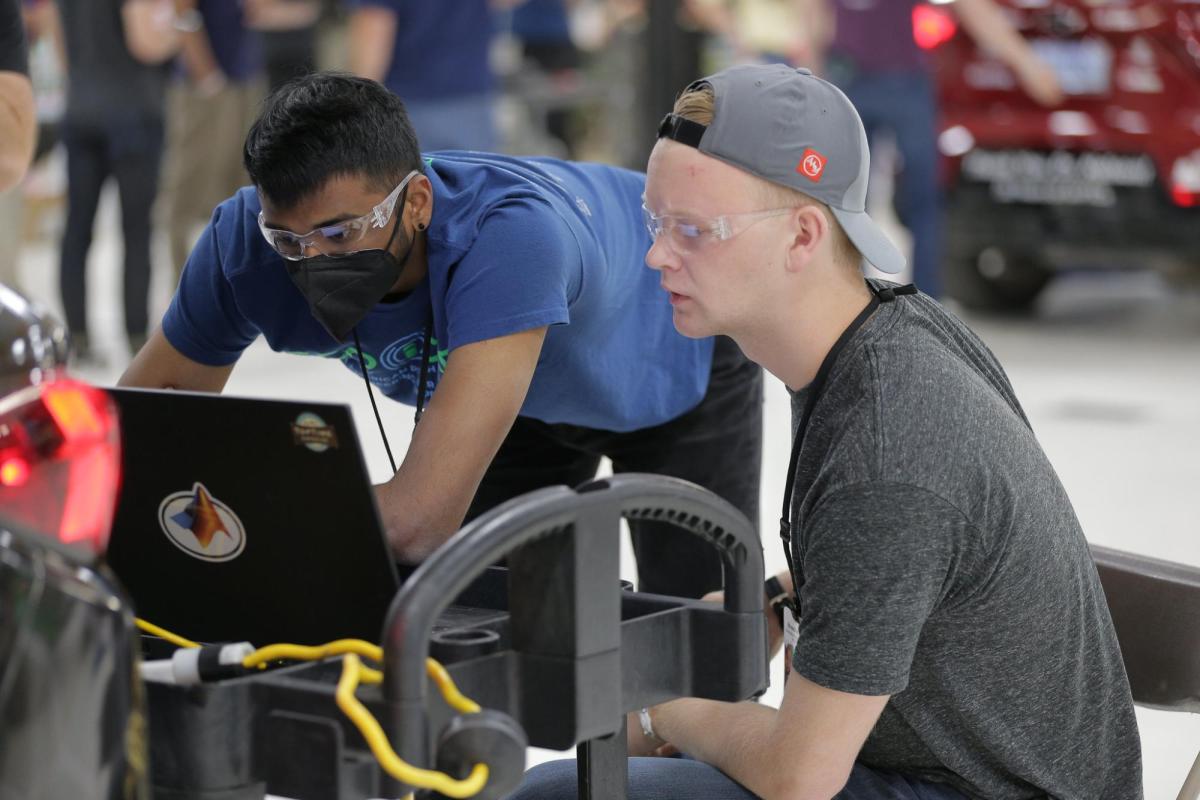 Nishan Nekoo and Braeden Dickson test the car.