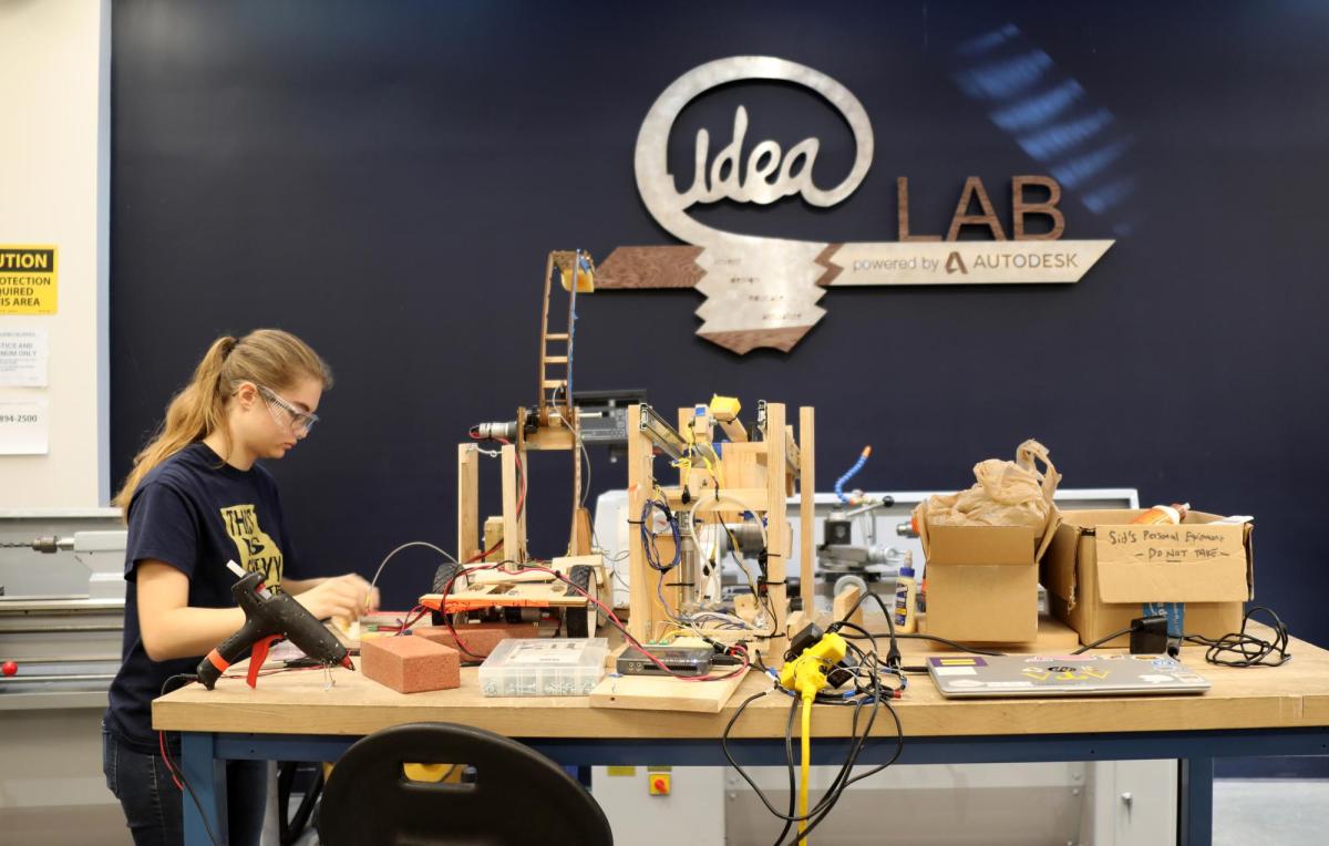 a female student works on the IDEA Lab