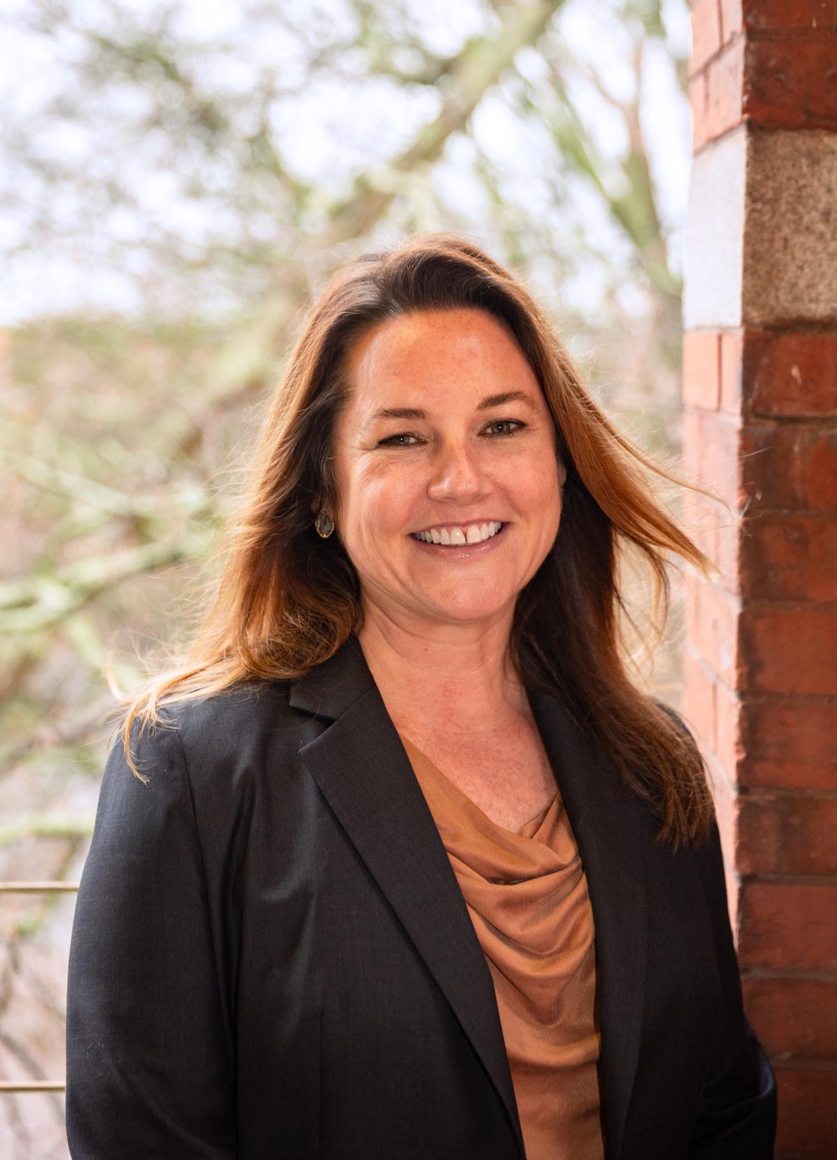 Kim Kurtis standing in the doorway of Tech Tower