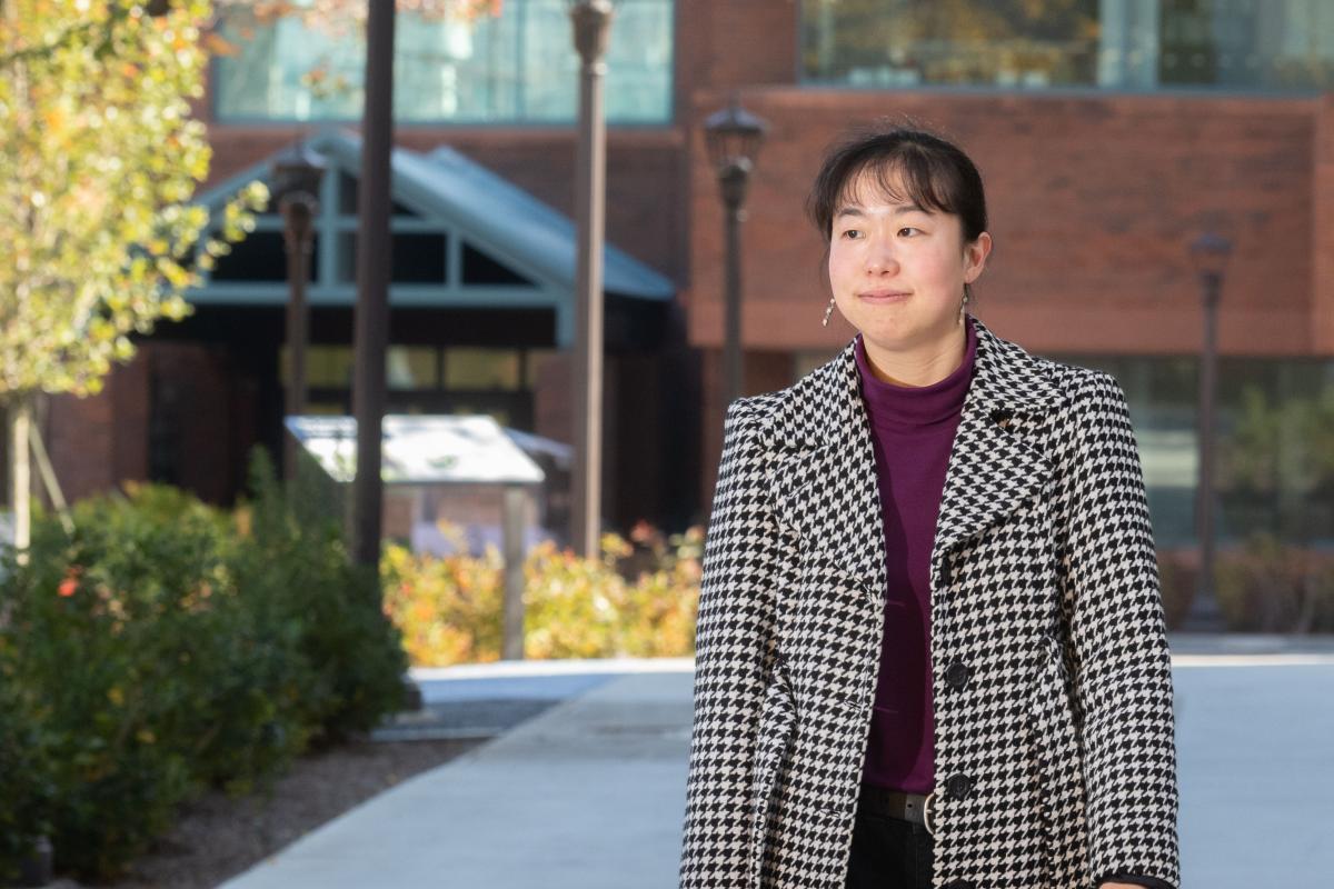 Iris Tien walks on campus