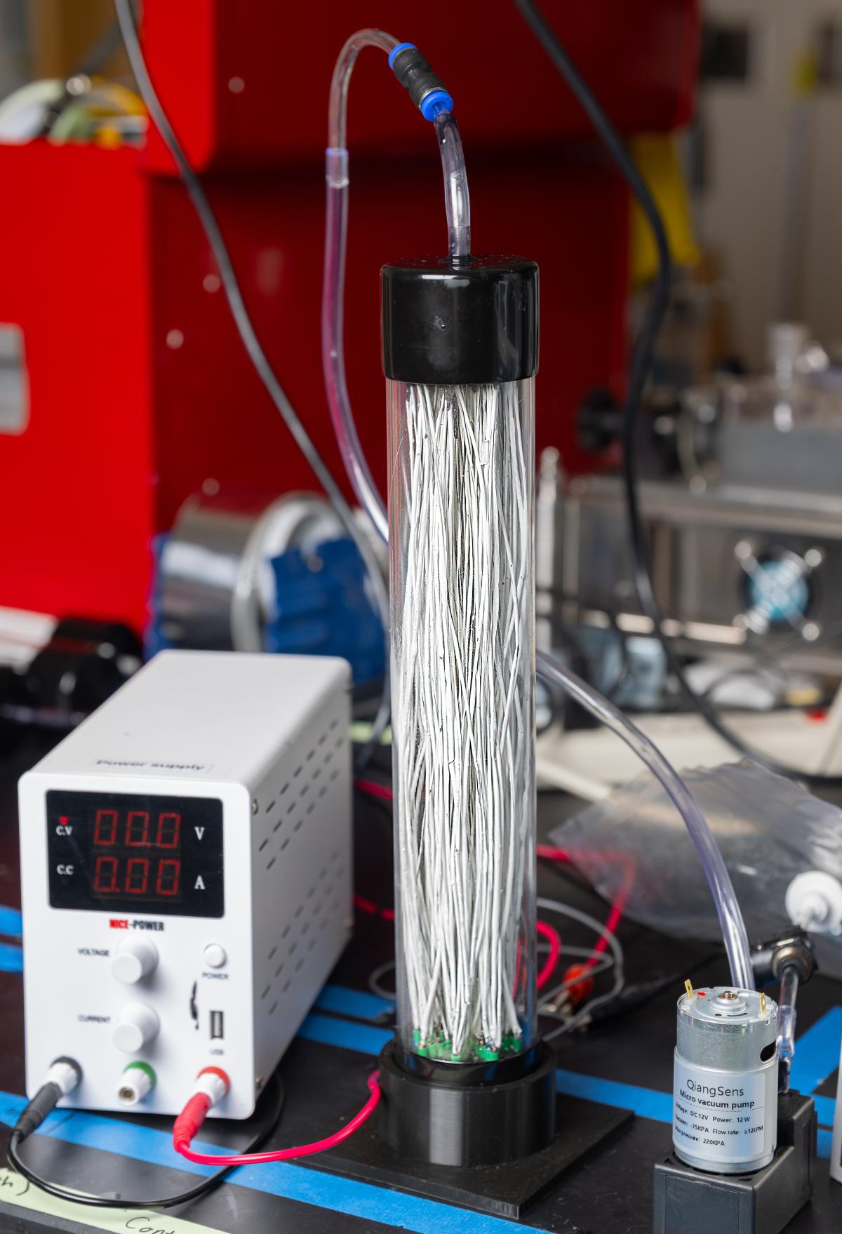 Sorbent-coated carbon fibers in a tube 
