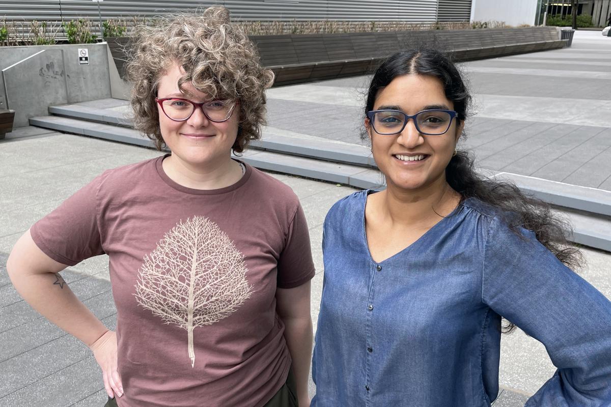 Eva Dyer and Vidya Muthukumar outside the CODA building.