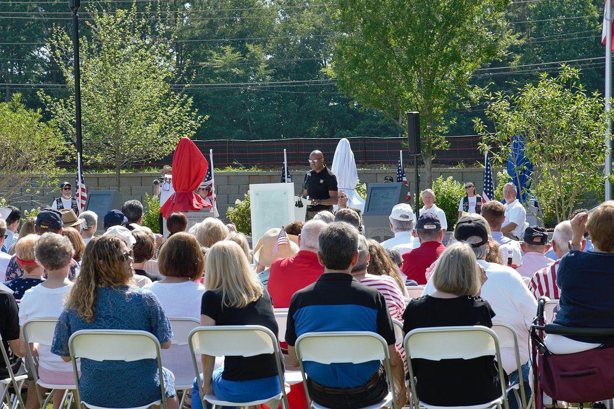 Ronald Johnson speaking in front of a crowd.