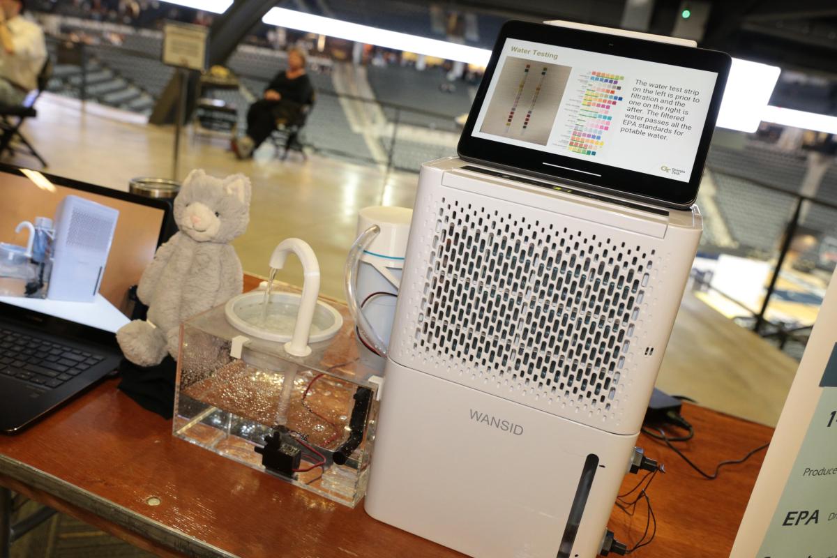 dehumidifier machine connected to doggie bowl